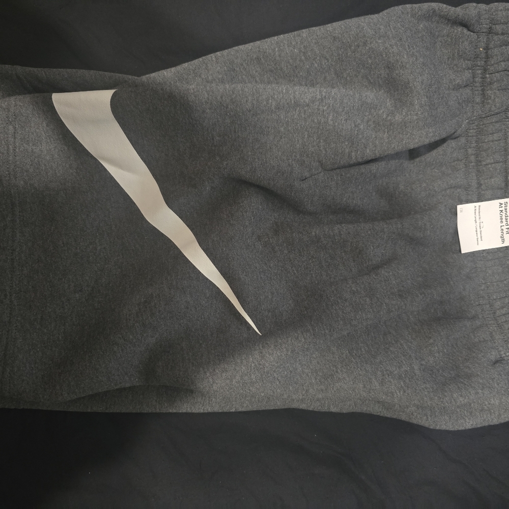 Gray Nike Shorts  with White Nike Swoosh